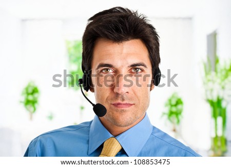 Portrait of an handsome customer representative at work