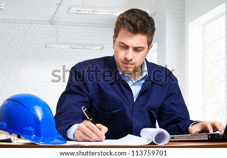 Engineer working at his desk