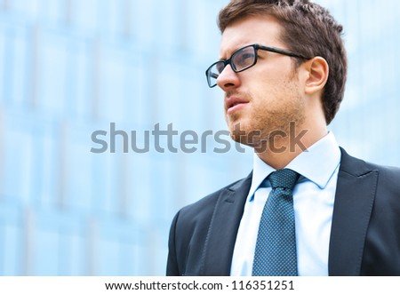 Portrait of an handsome businessman outdoor in the city