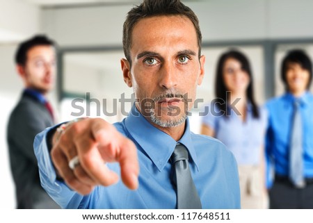 Man pointing his finger at you