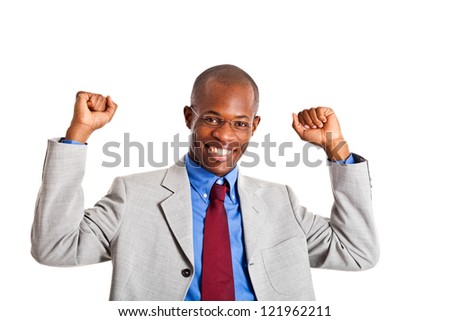 African businessman in a victory pose
