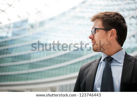 Handsome businessman in the city