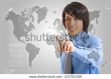Man pointing his finger on a digital world map