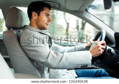 Man driving his car