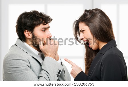 Woman yelling out to a scared man