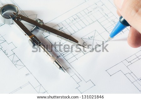 Engineer drawing a construction project