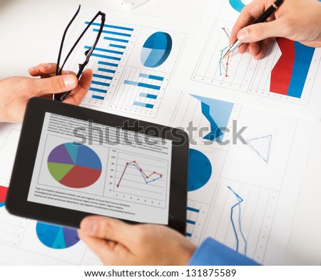 Business people discussing during a meeting Business people discussing during a meeting