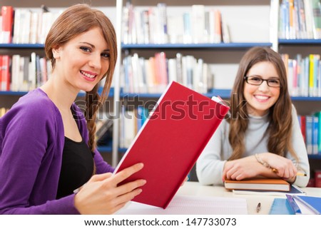 Students at work in a library