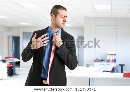 Man sweating in his office