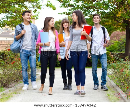 Group of college students walking together