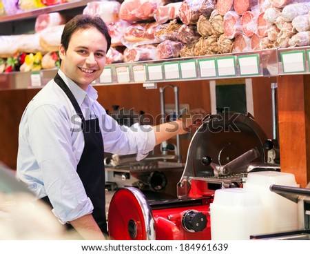 Shopkeeper at work in a grocery store