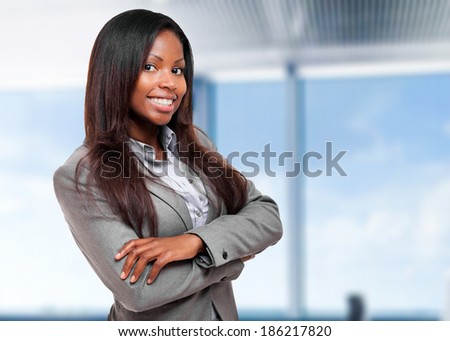 Smiling black business woman in her office