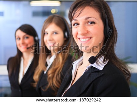 Portrait of a smiling customer representative at work