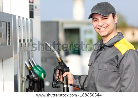 Gas station attendant at work