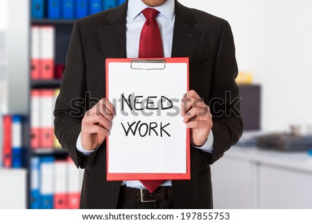 Businesswoman holding a sign to find a job