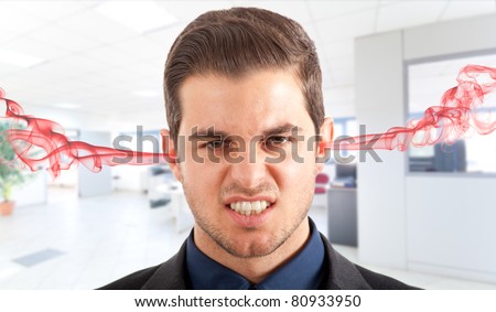 Angry frustrated businessman with exploding head