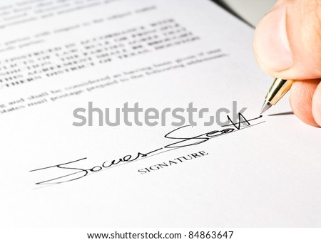 Hand signing a contract. The signature is imaginary.