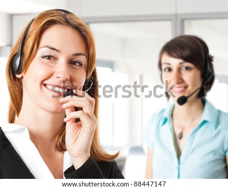 Portrait of a beautiful customer representative smiling in her office