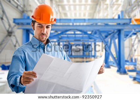 Portrait of a site manager reading a drawing