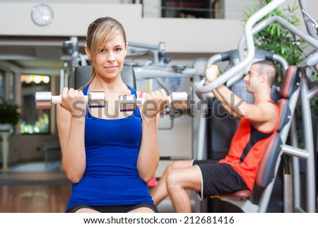 Woman working out in a fitness club