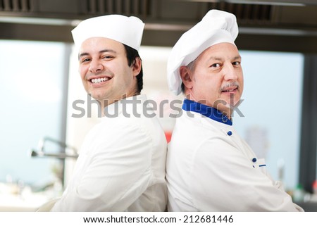 Couple of chefs in the kitchen