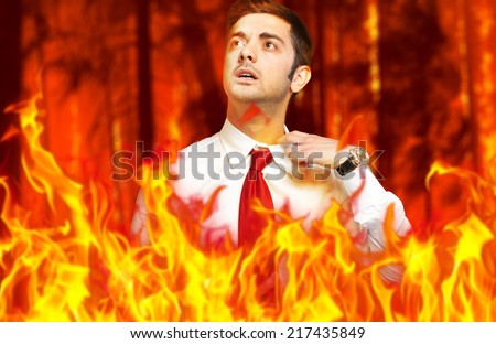 Businessman in flames: stressed by troubles