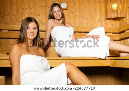Young women relaxing in a sauna