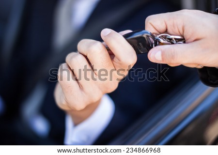 Man taking car key
