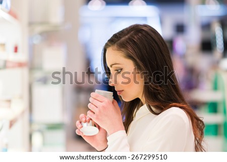 Portrait of a woman shopping in a beauty shop