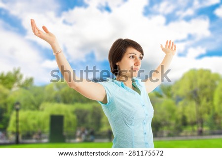 Woman with arms open enjoying the sun