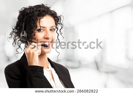 Portrait of a beautiful customer representative woman at work