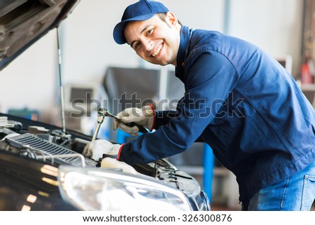 Mechanic at work in his garage