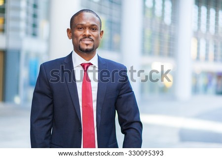 Smiling african businessman outdoor