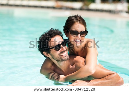 Couple having fun in a swimming pool