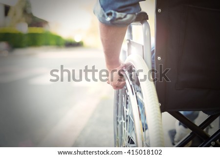 Detail of a disabled man on a wheelchair