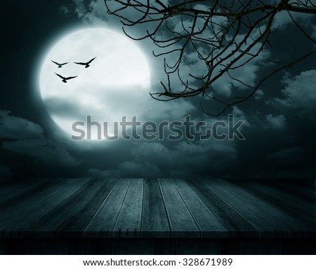 Halloween background, Wooden floor with branch and blurred full moon, Dark style.