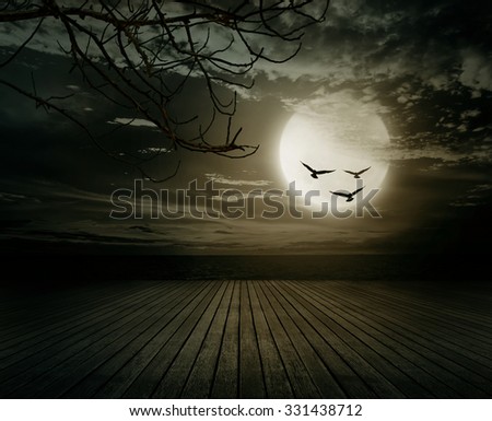 Halloween background, Wooden floor with branch and blurred full moon, Dark style.