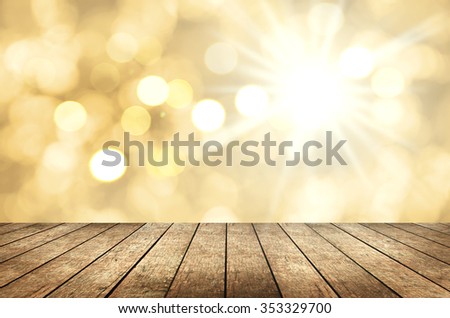 Wood floor top on gold bokeh abstract background, can be used for montage or display your products