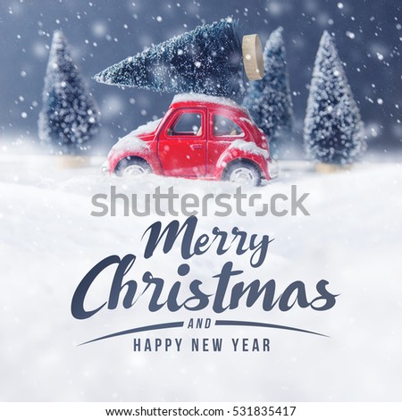 Christmas tree on red car toy with snow, Winter, Merry Christmas holiday celebration and Happy new year concept, copy space, filter effect.
