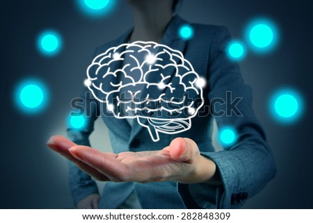 woman hold brain symbol on hand