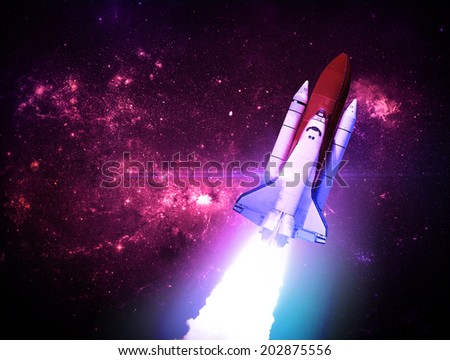 Rocket Against Starry Background - Elements of this Image Furnished By NASA