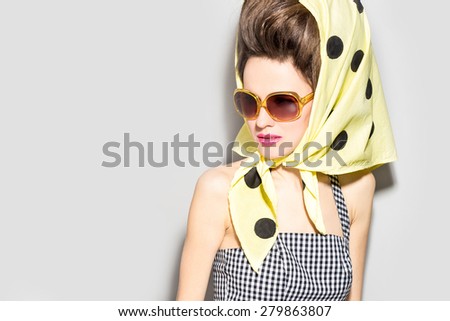 Fashion woman in scarf. Retro woman