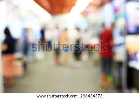 Blurred soft people in trade fair for background