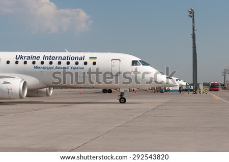 KIEV, UKRAINE - MAY 20, 2015: Ukraine International airlines\' fleet of aircraft stand at peron and ready to fly at Borispol International Airport on May 20, 2015 in Borispol, Ukraine