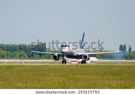 KIEV, UKRAINE - MAY 20, 2015:  Aeroflot  Sukhoi Superjet 100-95b taxis to teminal at International Borispol airport on May 20, 2015. Aeroflot is flag carrier and largest airline of Russian Federation.
