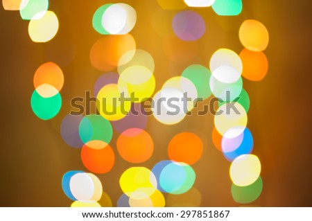 glitter vintage lights background. Golden, silver and blue de-focused circle.