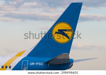 KIEV, UKRAINE - JULY 10, 2015: Aircraft Tail with logo sign of Ukraine international airlines in Borispol Airport.