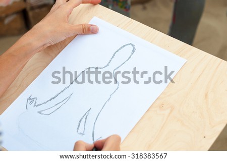 hand drawing a man in the yoga meditation position or asana.