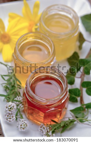 Three jars of organic honey