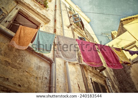 Towels hanging on a clothes line in Corfu Old Town